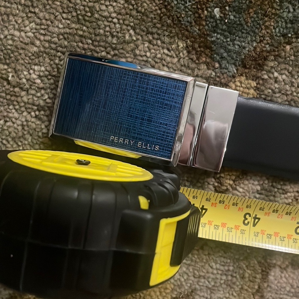 Mens black leather Perry Ellis belt. Size 38/05. 44” long..